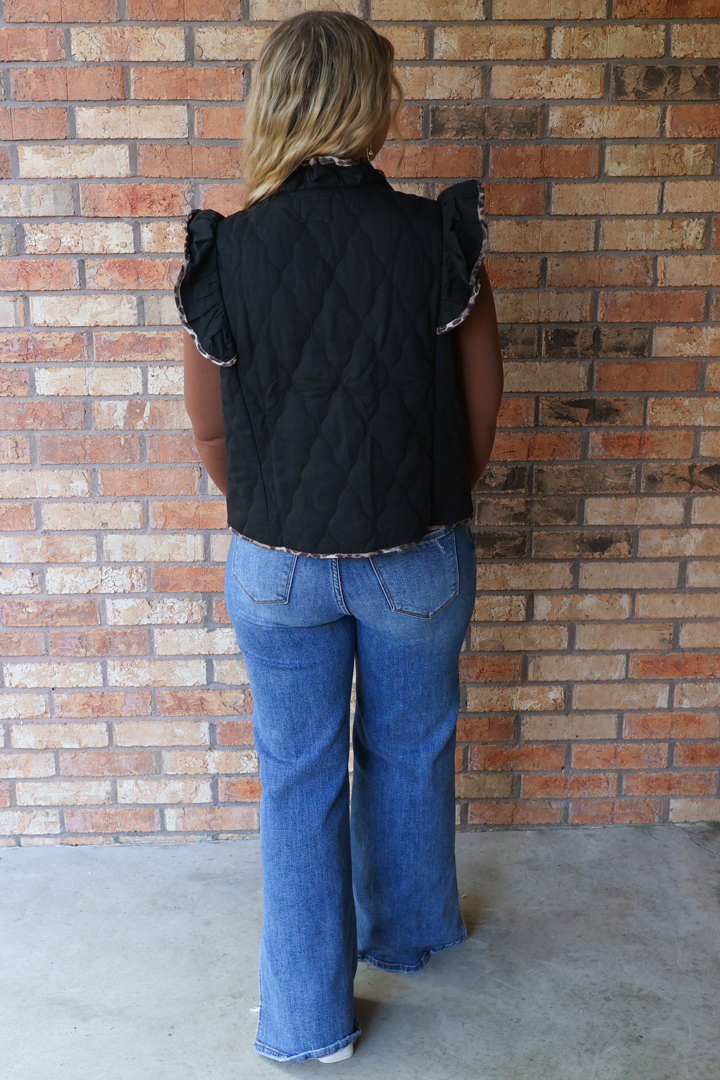 She Reigns Leopard Trim Quilted Ruffle Vest, Black