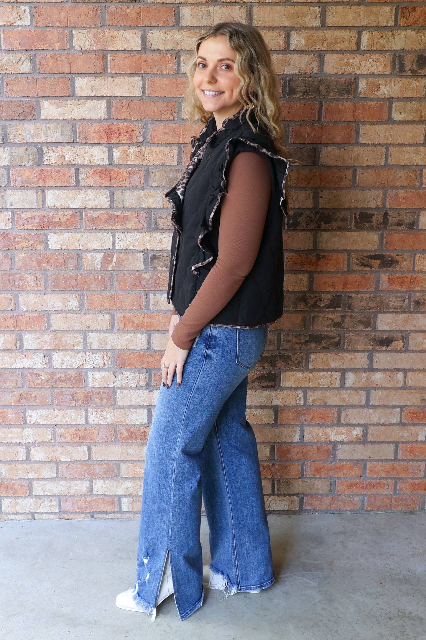 She Reigns Leopard Trim Quilted Ruffle Vest, Black